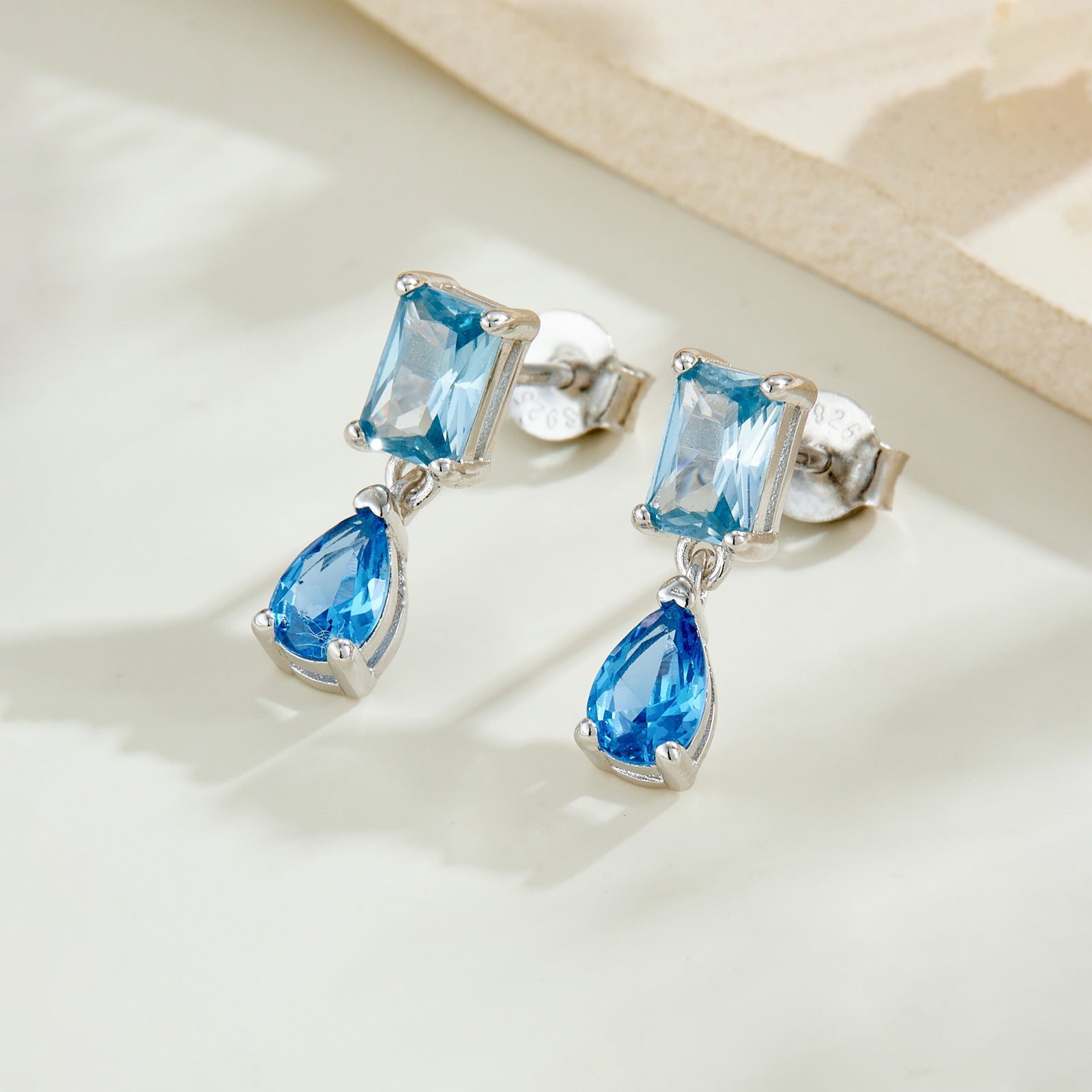 925 Sterling Silver Emerald Cut and Pear Blue CZ Drop Earrings 40200766